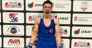 Turkish boxer Kerem Özmen celebrates his win in the U22 European Boxing Championship in Porec, Croatia, March 24, 2022. (IHA Photo)