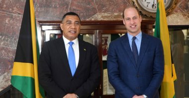 Britain's Prince William (R) and Jamaican Prime Minister Andrew Holness (L) during a meeting at the residence of the Jamaican prime minister in Kingston, Jamaica, March 23, 2022. (EPA Photo)