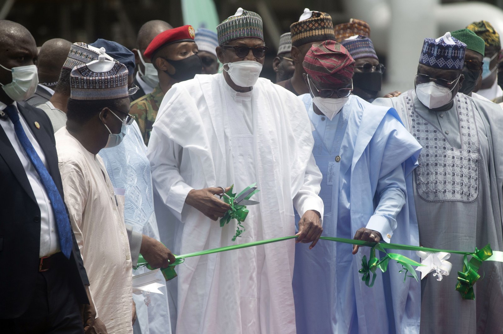 Nigerian President Muhammadu Buhari (C) during the commissioning of Dangote fertilizer plant in Lagos, Nigeria, March 22, 2022. (AP Photo)