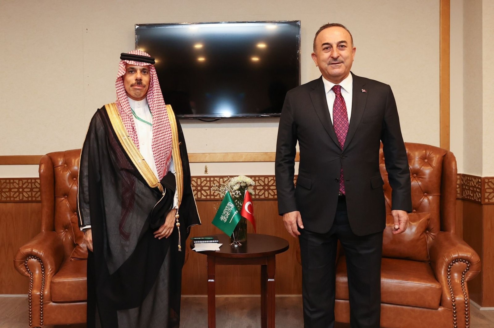 Foreign Minister Mevlüt Çavuşoğlu (R) meets with Saudi Foreign Minister Prince Faisal bin Farhan Al Saud in Islamabad, Pakistan, March 22, 2022. (DHA)