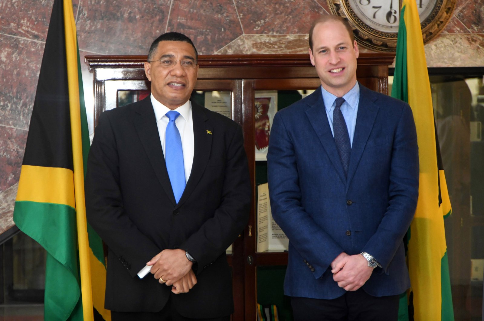 Britain&#039;s Prince William (R) and Jamaican Prime Minister Andrew Holness (L) during a meeting at the residence of the Jamaican prime minister in Kingston, Jamaica, March 23, 2022. (EPA Photo)