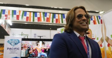 Prabhakar Sharan, actor, producer and businessperson for Bollywood movies talk with the media before signing an agreement to produce Bollywood-style movies in Panama, during Expocomer 2022 international trade show in Panama City, Wednesday, March 23, 2022. (AP)