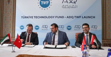 From left to right, TWF CEO Arda Ermut, ADQ CEO Mohamed Hassan Alsuwaidi and Turkey’s Investment Office head Ahmet Burak Dağlıoğlu during a launching ceremony of the Turkey Technology Fund – ADQ TWF in Istanbul, Turkey, March 23, 2022. (AA Photo)