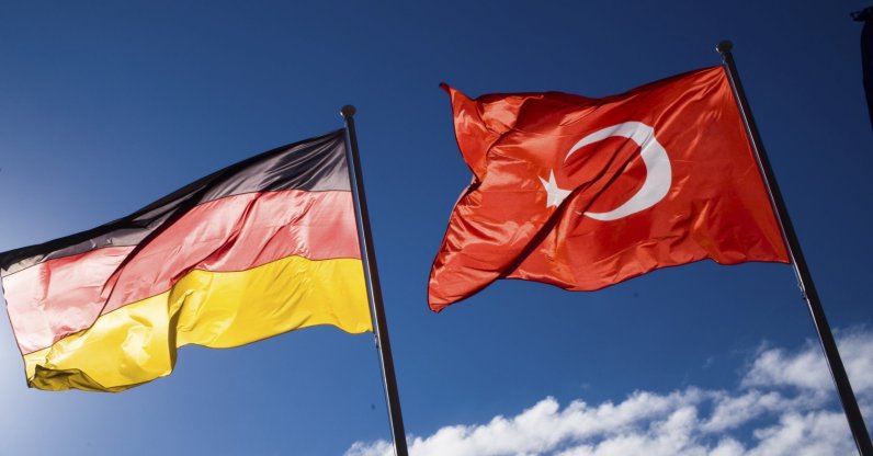 A German and Turkish flag wave at the Tegel airport prior to the arrival of President Recep Tayyip Erdoğan for an official state visit in Germany at the capital Berlin, Thursday, Sept. 27, 2018. (AP File Photo)
