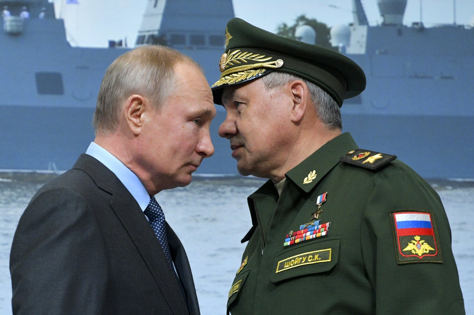 Russian President Vladimir Putin (L) and Russian Defense Minister Sergei Shoigu during a visit to a shipyard in St. Petersburg, Russia, April 23, 2019. (AP Photo)