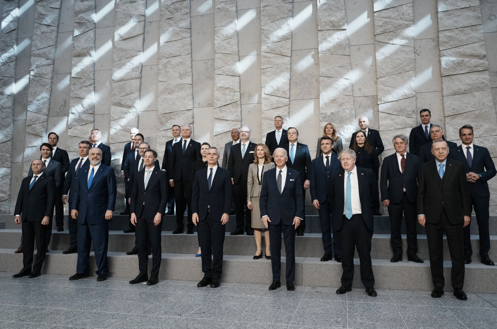 NATO heads of state pose for a group photo during an extraordinary NATO summit at NATO headquarters in Brussels, Belgium, March 24, 2022. (AP Photo)