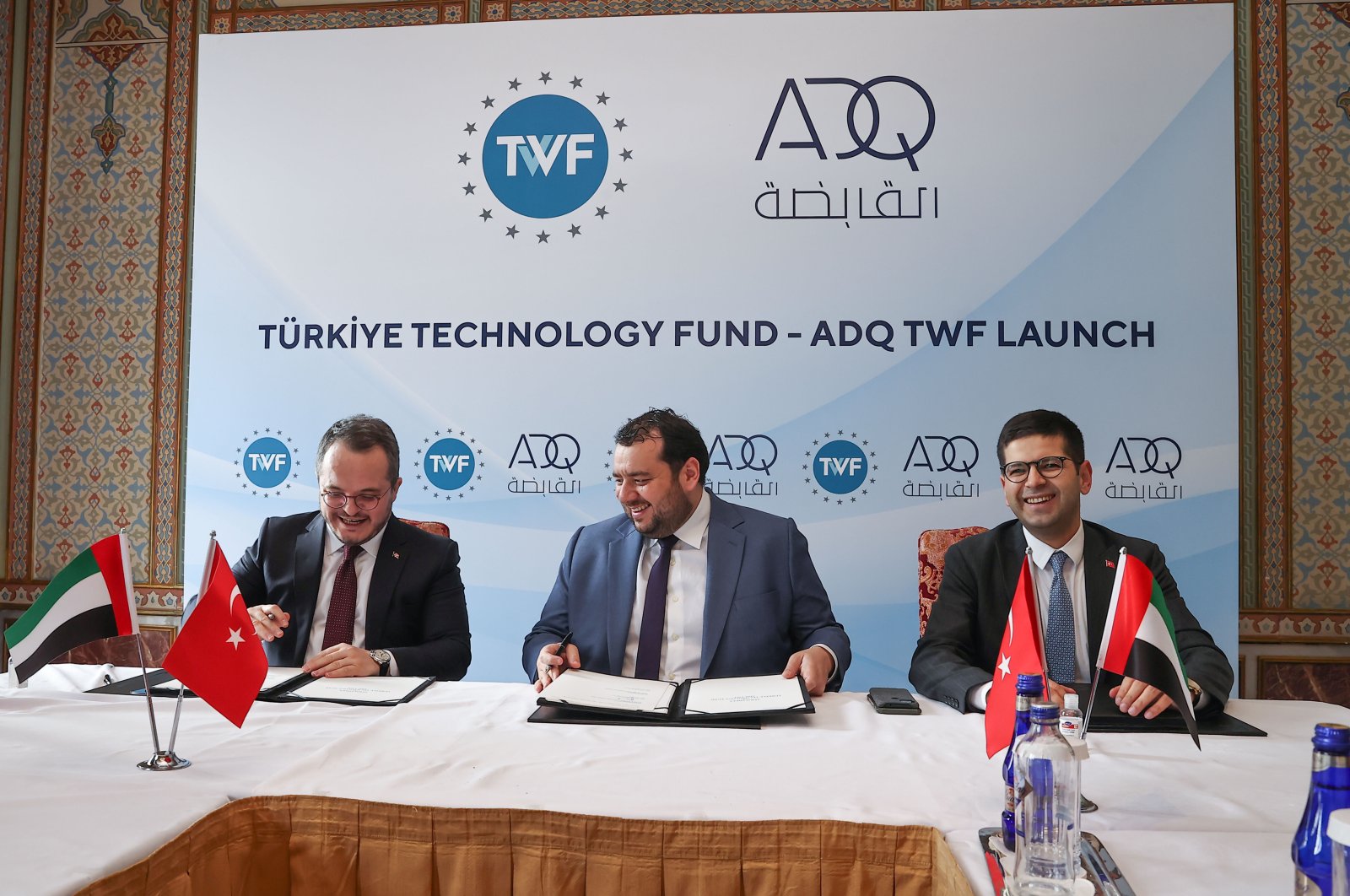 From left to right, TWF CEO Arda Ermut, ADQ CEO Mohamed Hassan Alsuwaidi and Turkey’s Investment Office head Ahmet Burak Dağlıoğlu during a launching ceremony of the Turkey Technology Fund – ADQ TWF in Istanbul, Turkey, March 23, 2022. (AA Photo)