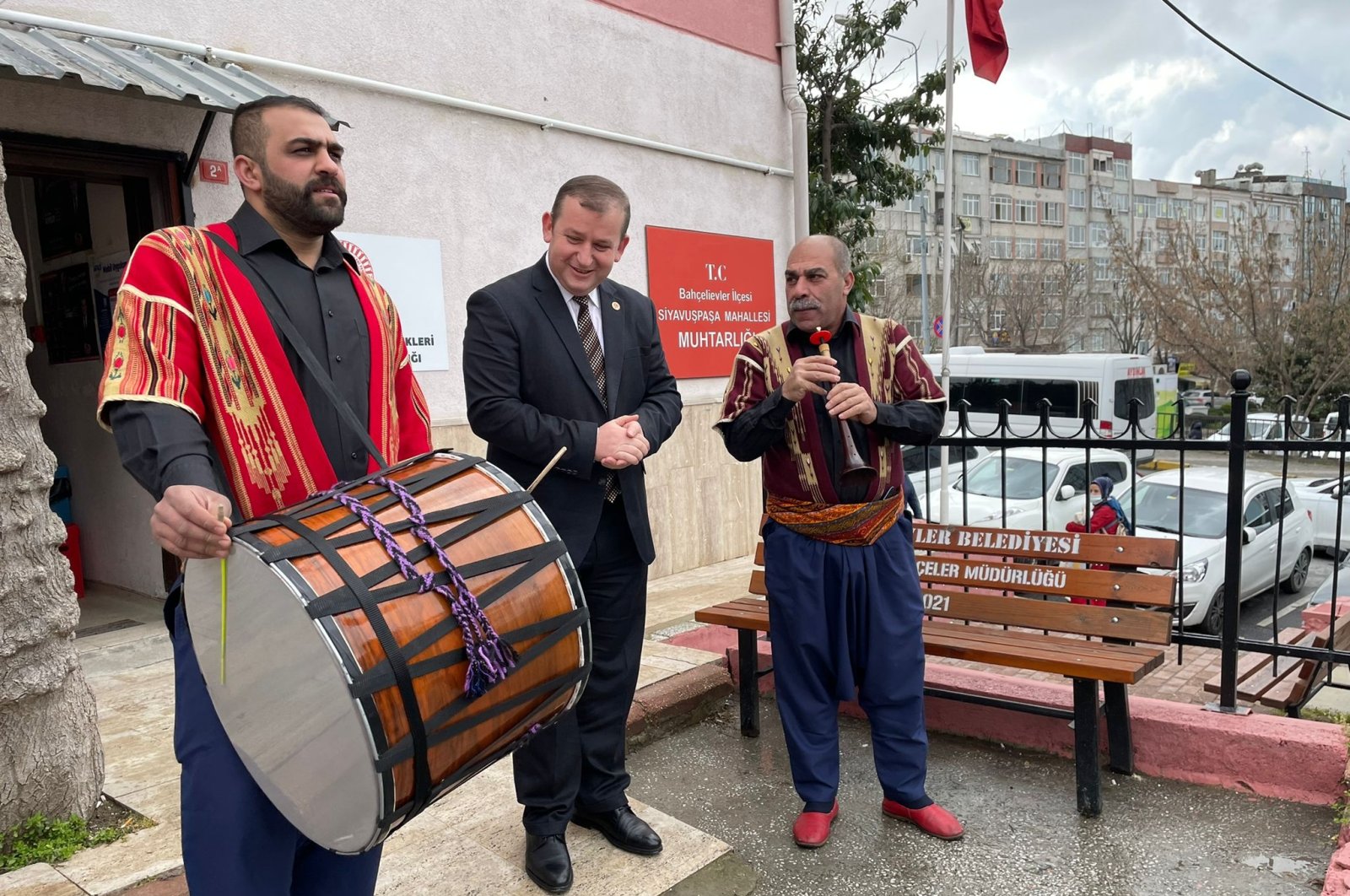 Drummers Ali Bulur (R) and Muharrem Bulur (L) pose with Selami Aykut, head of the federation of mukhtars, in Istanbul, Turkey, March 24, 2022. (AA PHOTO)