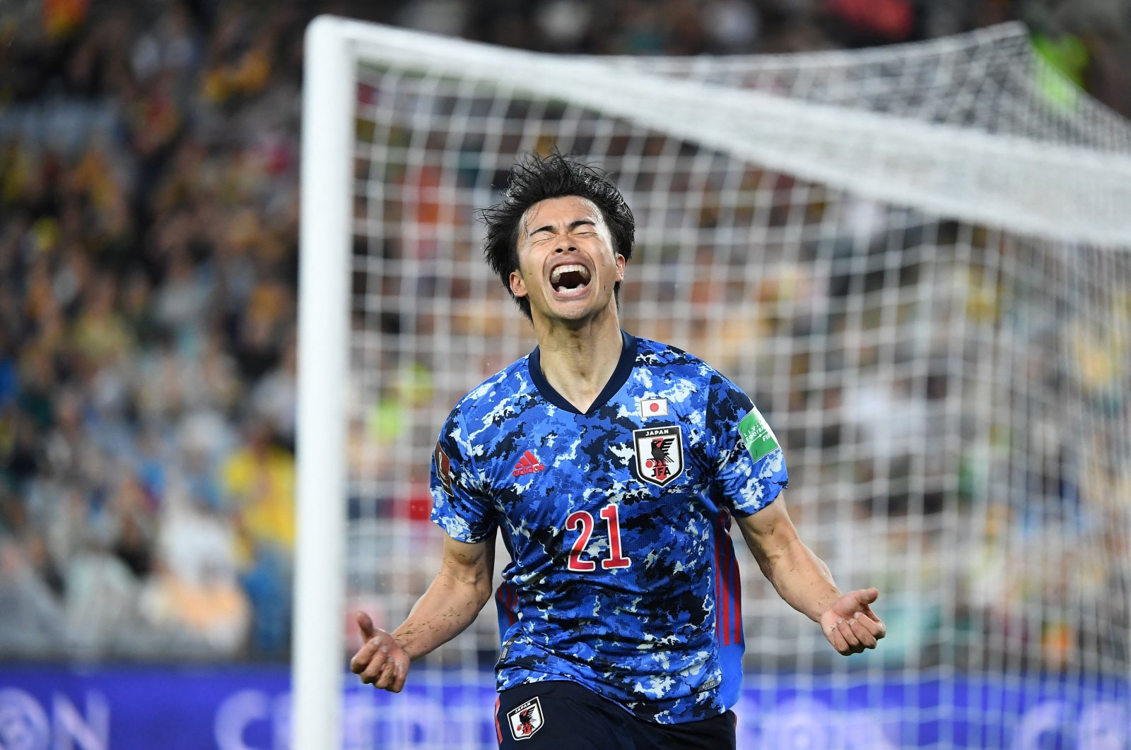 Japan&#039;s Kaoru Mitoma celebrates after scoring in a Qatar World Cup 2022 Asian qualifiers against Australia, Sydney, March 24, 2022. (AFP Photo)