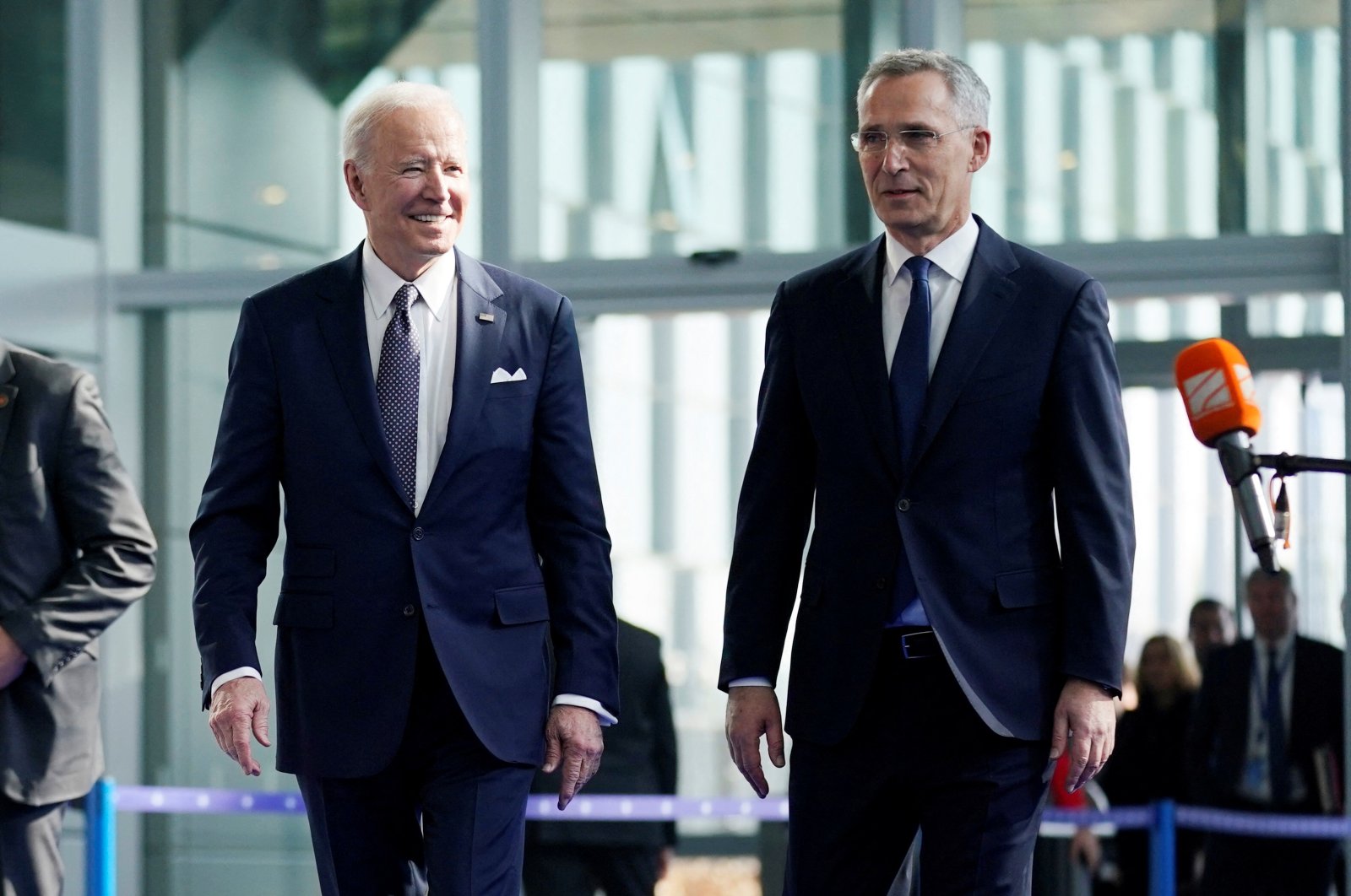 President Joe Biden walks with NATO Secretary-General Jens Stoltenberg as he arrives for meetings with NATO allies about the Russian invasion of Ukraine, in Brussels, Belgium, March 24, 2022. (Reuters Photo)