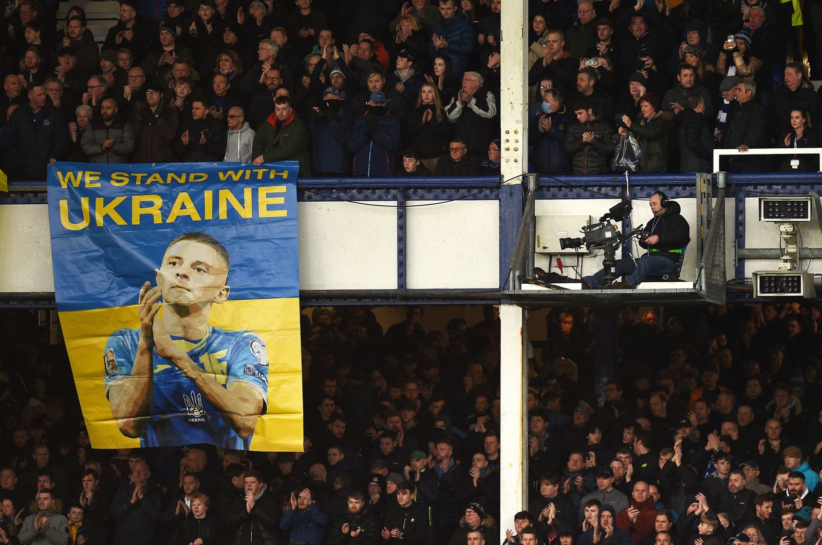 A banner that reads "We stand with Ukraine" is seen during a Premier League match between Everton and Man City, Liverpool, England, Feb. 26, 2022. (AFP Photo)
