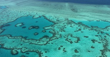 An aerial view of the Great Barrier Reef off the coast of the Whitsunday Islands, along the central coast of Queensland, Australia, Nov. 20, 2014. (AFP Photo)