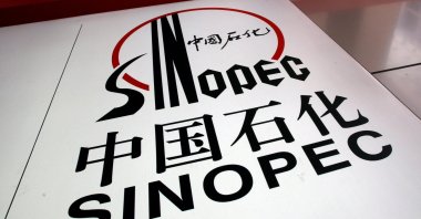 The company logo of Sinopec Corp is displayed at a gas station in Hong Kong, China, Aug. 26, 2008. (Reuters Photo)
