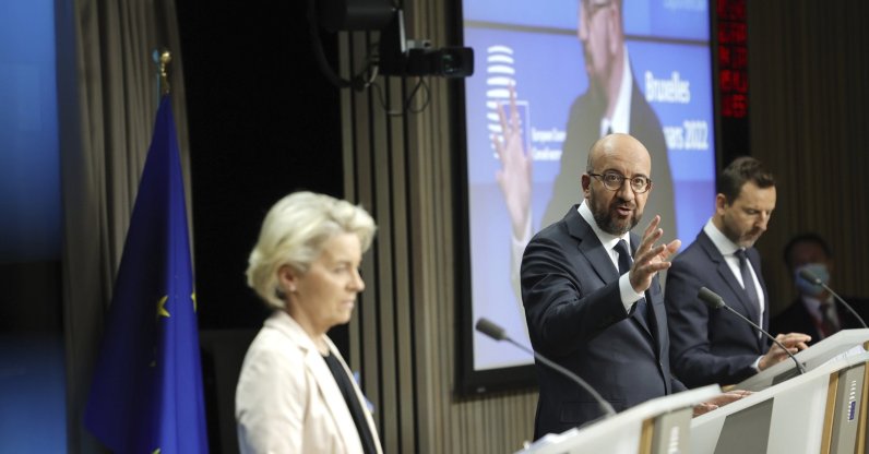 European Council President Charles Michel (C) and European Commission President Ursula von der Leyen (L) participate in a media conference after an EU summit in Brussels, Belgium, March 25, 2022. (AP Photo)