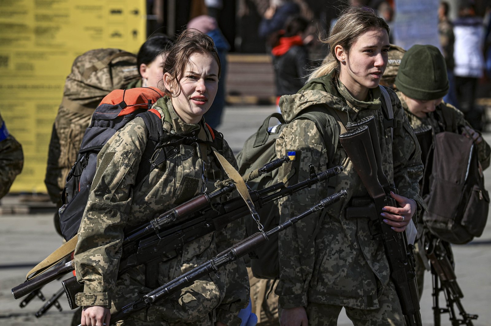 Female Ukrainian soldiers walk in a train station in the western city of Lviv, Ukraine, March 25, 2022. (AA Photo)
