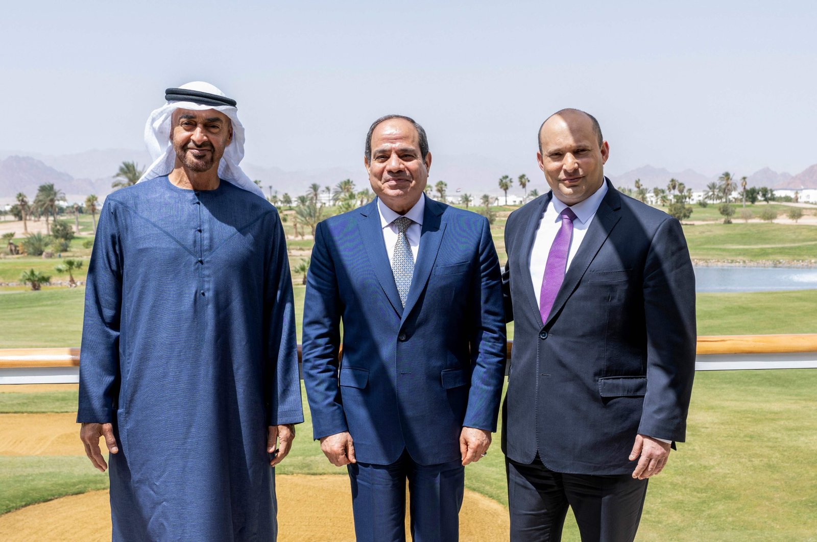Abu Dhabi Crown Prince Sheikh Mohammed bin Zayed Al Nahyan (L), Egyptian President Abdel-Fattah el-Sissi (C) and Israeli Prime Minister Naftali Bennett pose for a picture after a meeting in the Red Sea resort of Sharm el-Sheikh, Egypt, in this handout released by the UAE Ministry of Presidential Affairs on March 22, 2022. (AFP Photo)