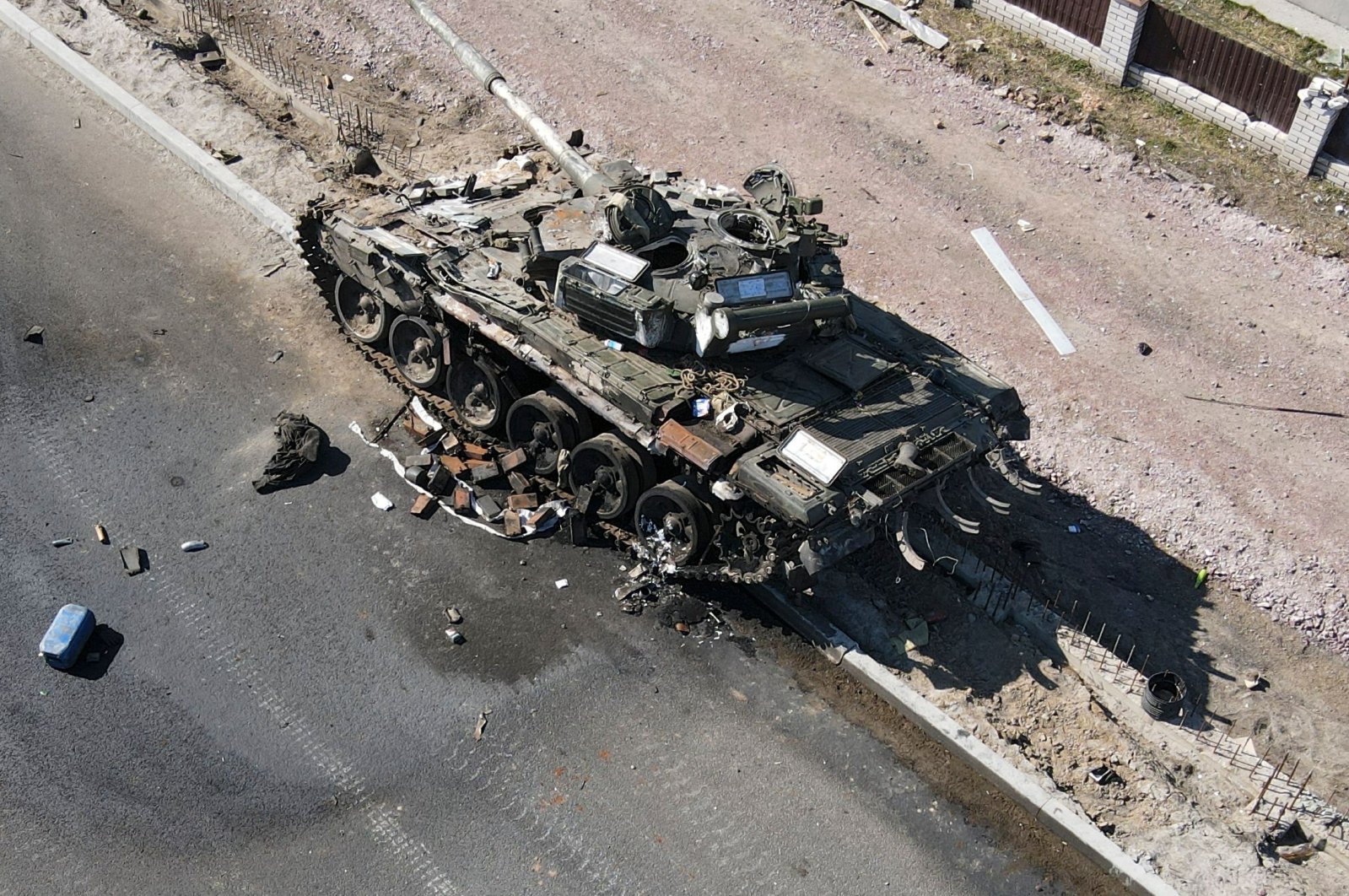 This handout picture taken and released by the Press service of the Ukrainian Ground Forces shows a charred Russian tank, amid Russia&#039;s invasion of Ukraine, on the front line in the Kyiv region, March 20, 2022. (Photo by Press service of the Ukrainian Ground Forces / AFP)