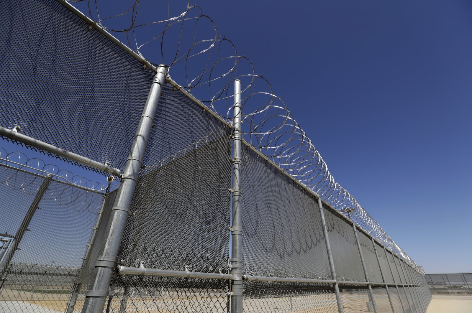Shown is the Adelanto U.S. Immigration and Enforcement Processing Center operated by GEO Group, Inc. (GEO) a Florida-based company specializing in privatized corrections in Adelanto, California, U.S., Aug. 28, 2019. (AP File Photo)