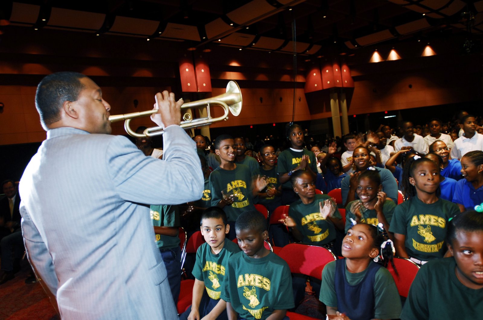 Jazz trumpeter Wynton Marsalis performs for school children during a program &quot;Cookin&#039; with Jazz&#039;&#039; with celebrity chef Emeril Lagasse in New Orleans, U.S., Aug. 28, 2006, March 24, 2022. (AP File Photo)