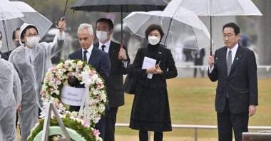 Japanese Prime Minister Fumio Kishida (R) and U.S. Ambassador to Japan Rahm Emanuel visit Hiroshima's Peace Memorial Park in Hiroshima, Japan, March 26, 2022. (Reuters Photo)