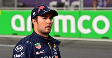 Red Bull's Mexican driver Sergio Perez walks on the grid after the qualifying session on the eve of the 2022 Saudi Arabia Formula One Grand Prix at the Jeddah Corniche Circuit, Suadi Arabia, March 26, 2022. (AFP Photo)