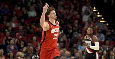 Rockets' Alperen Şengün (L) reacts in an NBA game against the Trailblazers, Portland, U.S., March 26, 2022. (AP Photo)
