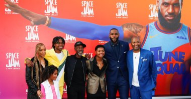 Cast members LeBron James, Don Cheadle, Cedric Joe, Sonequa Martin-Green, Ceyair Wright, Harper Alexander and Malcolm D. Lee pose as they attend the premiere for the film "Space Jam: A New Legacy" in Los Angeles, California, U.S., July 12, 2021. (Reuters Photo)
