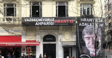 A poster of Hrant Dink hangs on the facade of the building of Agos where he worked as editor-in-chief, in Istanbul, Turkey, Jan. 20, 2019. (DHA PHOTO)