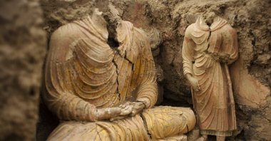 In this file photo made available on Oct. 12, 2010, Buddha statues are seen inside an ancient temple in the Mes Aynak valley, south of Kabul, Afghanistan. The valley is home to the world&#039;s second-largest unexploited copper deposit, estimated to be worth nearly $1 trillion. (AP File Photo)