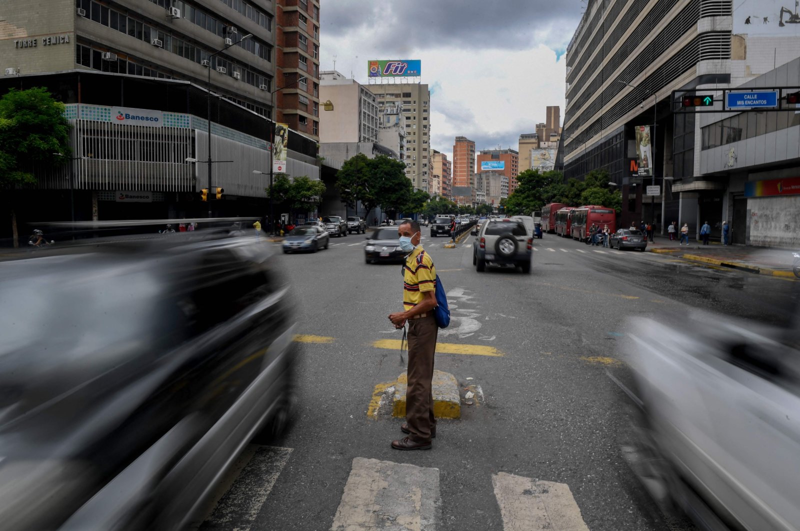 A man crosses a street in Caracas amid the COVID-19 pandemic, Venezuela, Sep. 3, 2020. (AFP Photo)