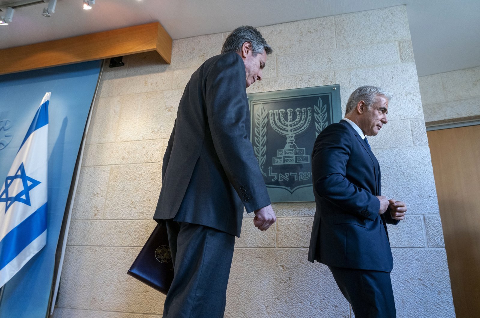 U.S. Secretary of State Antony Blinken (L) and Israel&#039;s Foreign Minister Yair Lapid walk together after a news conference at Israel&#039;s Ministry of Foreign Affairs in West Jerusalem, Israel, March 27, 2022. (AP Photo)
