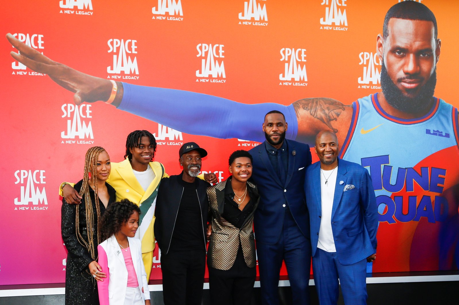 Cast members LeBron James, Don Cheadle, Cedric Joe, Sonequa Martin-Green, Ceyair Wright, Harper Alexander and Malcolm D. Lee pose as they attend the premiere for the film "Space Jam: A New Legacy" in Los Angeles, California, U.S., July 12, 2021. (Reuters Photo)