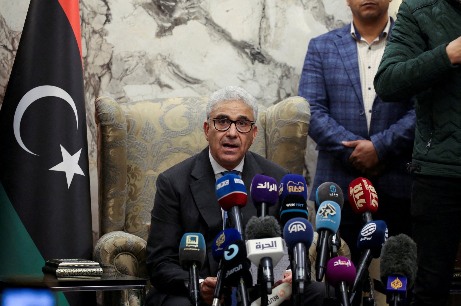 Fathi Bashagha, designated as prime minister by the parliament, delivers a speech at Mitiga International Airport, in Tripoli, Libya, Feb. 10, 2022. (Reuters File Photo)