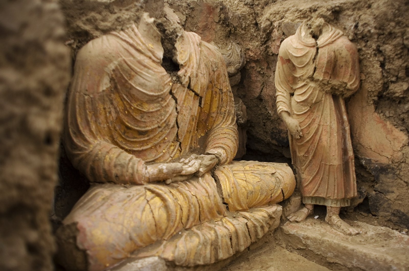 In this file photo made available on Oct. 12, 2010, Buddha statues are seen inside an ancient temple in the Mes Aynak valley, south of Kabul, Afghanistan. The valley is home to the world&#039;s second-largest unexploited copper deposit, estimated to be worth nearly $1 trillion. (AP File Photo)
