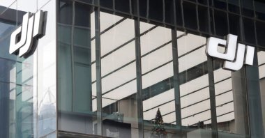 Logos of Chinese drone maker DJI are seen on the facade of its store in Beijing, China, Dec. 15, 2021. (Reuters Photo)