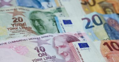 An assortment of Turkish lira and euro banknotes are shown, Sept. 4, 2018. (AFP File Photo)