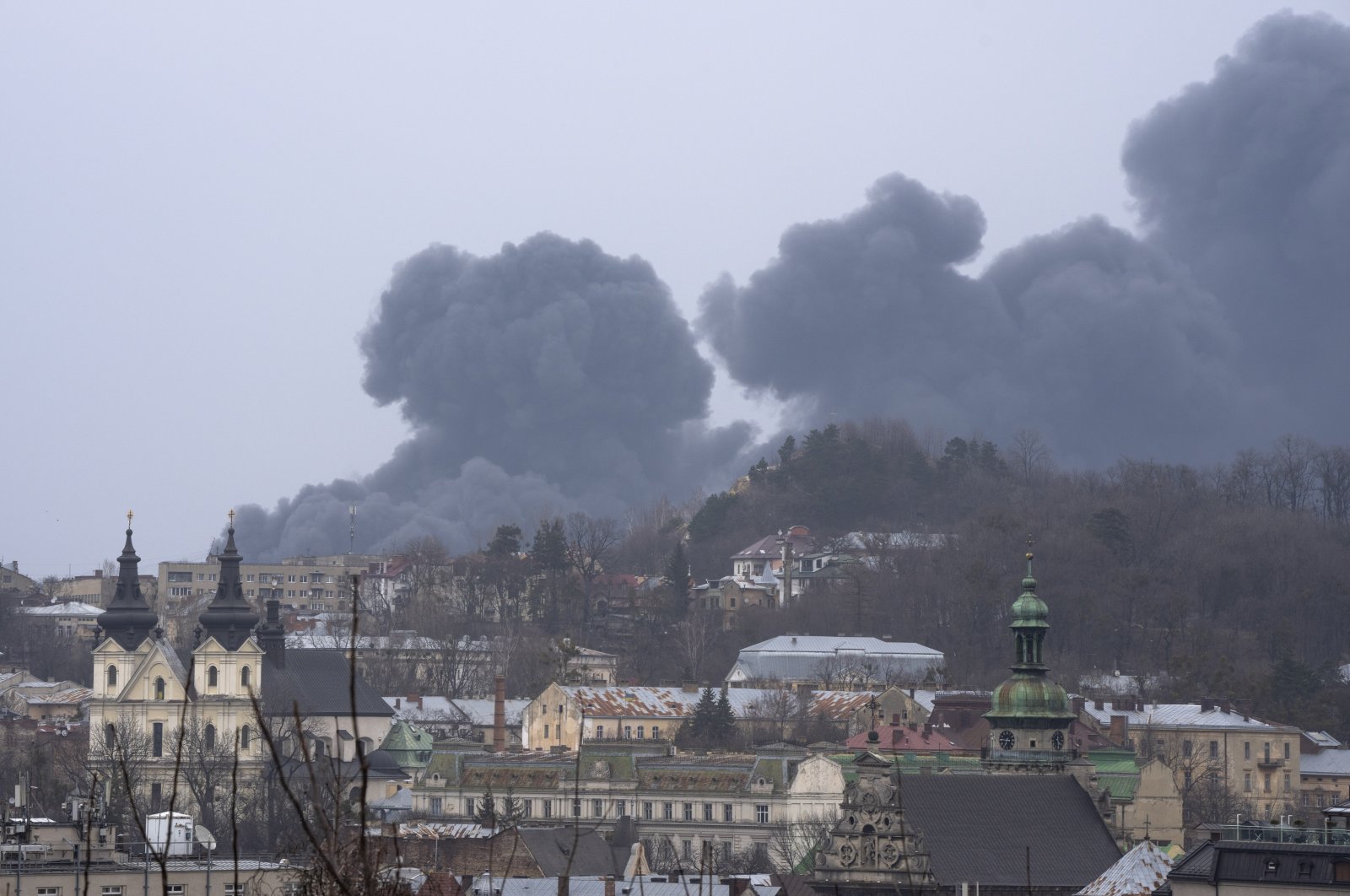 Smoke rises in the air in Lviv, western Ukraine, Saturday, March 26, 2022. (AP Photo)