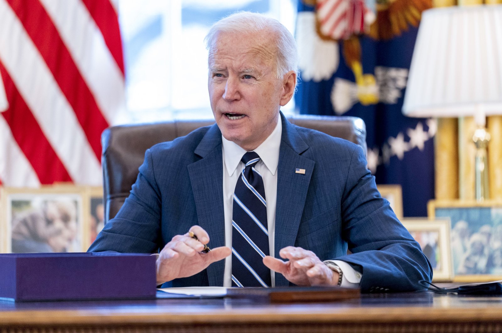 U.S. President Joe Biden speaks before signing the American Rescue Plan, a coronavirus relief package, in the Oval Office of the White House, Washington, March 11, 2021. (AP Photo)