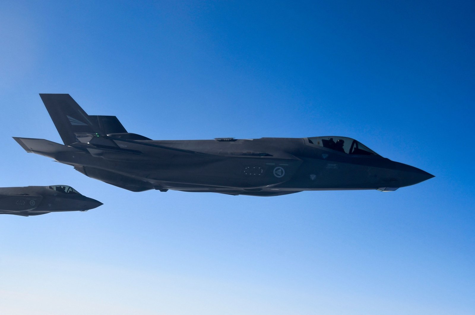 Norwegian F-35 fighter jets fly during NATO exercise "Cold Response" over Norway, March 22, 2022. (AFP Photo)