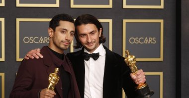 Riz Ahmed (L) and Aneil Karia (R), winners of the Academy Award for Best Live Action Short Film for &quot;The Long Goodbye,&quot; pose with their Oscar trophies in the press room during the 94th annual Academy Awards ceremony at the Dolby Theater in Hollywood, Los Angeles, California, U.S., March 27, 2022. (EPA)