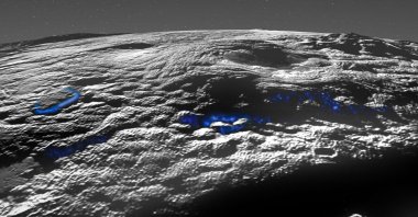 This image released by NASA / Johns Hopkins University Applied Physics Laboratory / Southwest Research Institute shows a perspective view of Pluto&#039;s icy volcanic region, March 29, 2022. (AFP Photo / NASA / Johns Hopkins University Applied Physics Laboratory / Southwest Research Institute / Isaac Herrera / Kelsi Singer)