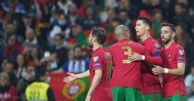 Portugal player Bruno Fernandes (R) celebrates with his teammates after scoring the second goal during the FIFA World Cup Qatar 2022 play-off qualifying soccer match Portugal vs North Macedonia held on Dragao stadium in Porto, Portugal, March 29, 2022.  (EPA Photo)