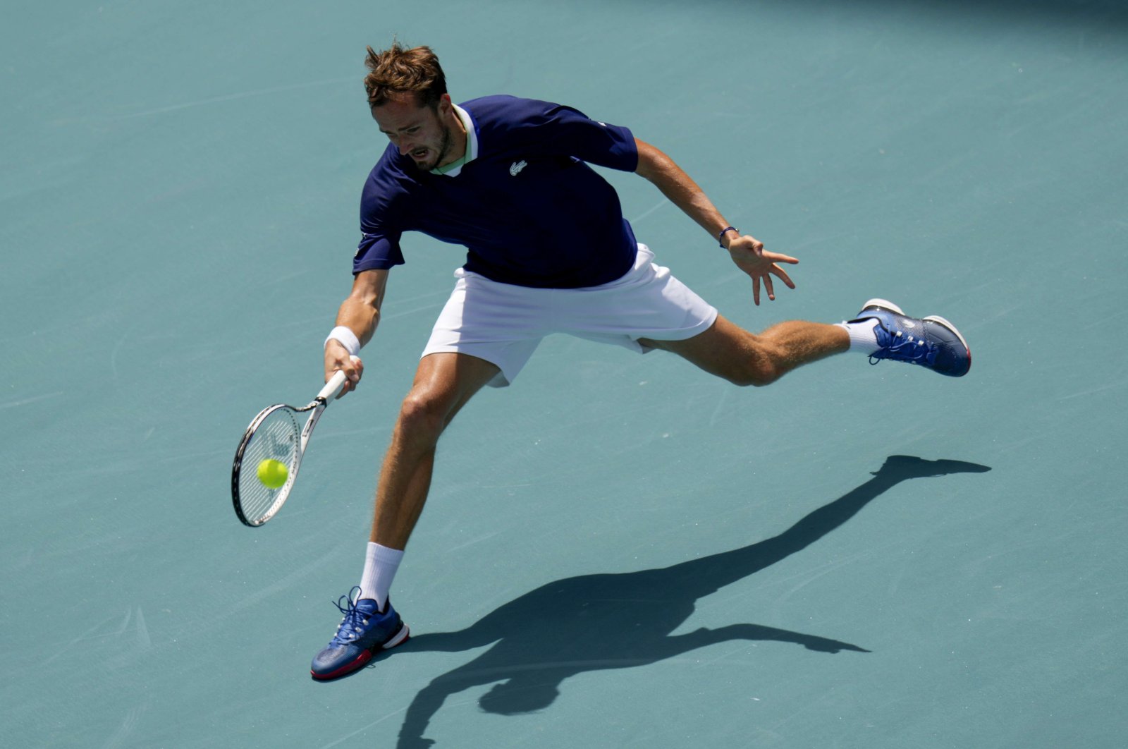 Daniil Medvedev returns a shot to Pedro Martinez at the Miami Open, Miami, Florida, U.S., March 28, 2022. (AFP Photo)