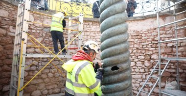 Restorers work on the Serpent Column, Sultanahmet square, Istanbul, March 29, 2021. (DHA) 