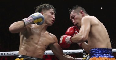 Japan&#039;s Naoya Inoue (L) fights the Philippines&#039; Nonito Donaire in Saitama, Japan, Nov. 7, 2019. (AP Photo)