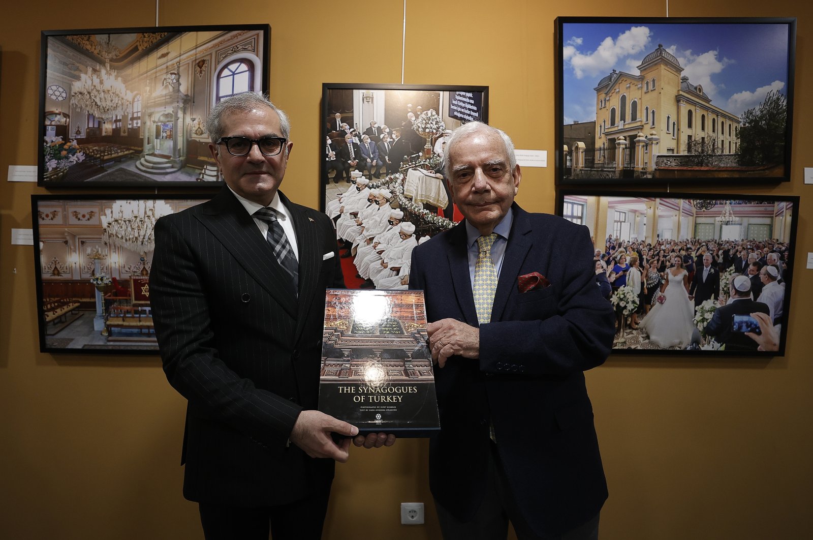 Turkey&#039;s Ambassador to Madrid, Burak Akçapar (L) and photographer Izzet Keribar at the commemoration event of Sephardic Jews, Madrid, Spain, March 28, 2022. (AA photo)