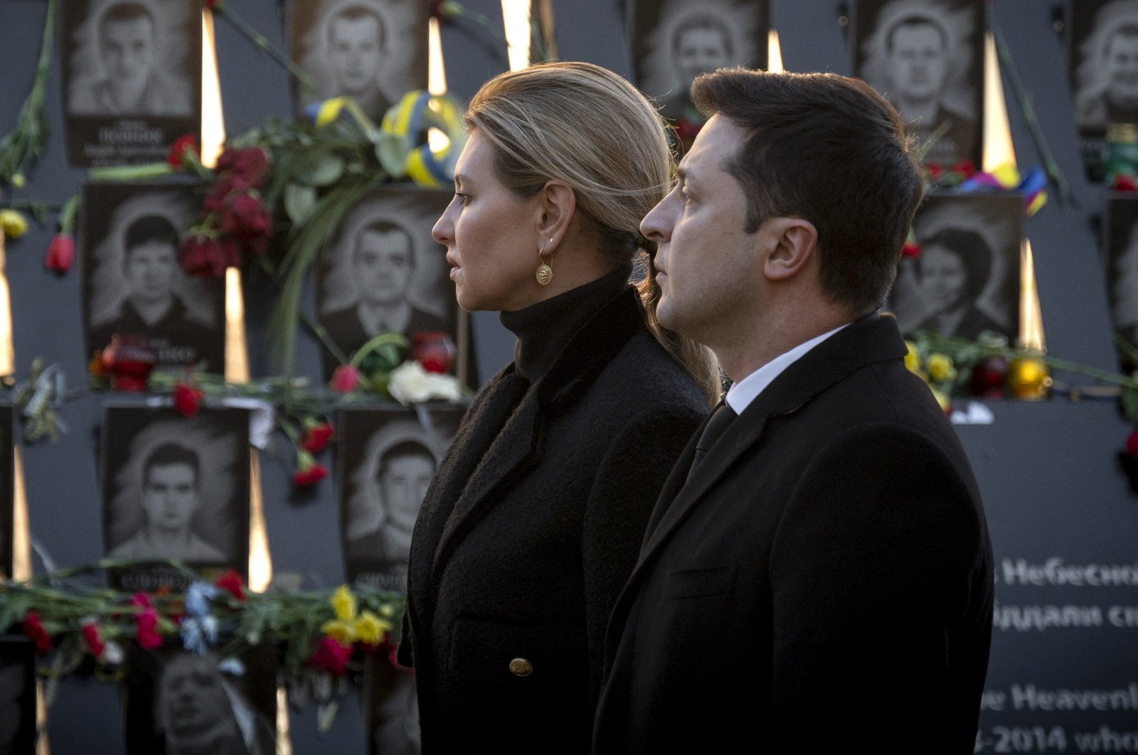 In this handout file photo dated Feb. 20, 2022, made available by the Ukrainian Presidency on the Day of the Heroes of the Heavenly Hundred, Ukraine&#039;s first lady Olena Zelenska (L) and her husband, Ukrainian President Volodymyr Zelenskyy, honor the memory of activists who died in 2014 during the Revolution of Dignity. (Photo by Ukrainian Presidency/ABACAPRESS.COM via Reuters)