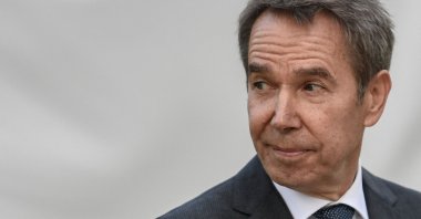 Jeff Koons looks on as he delivers a speech before the unveiling of his work the &quot;Bouquet of Tulips&quot; near The Petit Palais Museum in Paris, France, Oct. 4, 2019. (AFP)