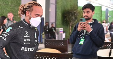 Mercedes&#039; Lewis Hamilton (L) leaves following a meeting with other F1 drivers and principals before a practice session ahead of the 2022 Saudi Arabia F1 GP, Jeddah, Saudi Arabia, March 25, 2022. (AFP Photo)