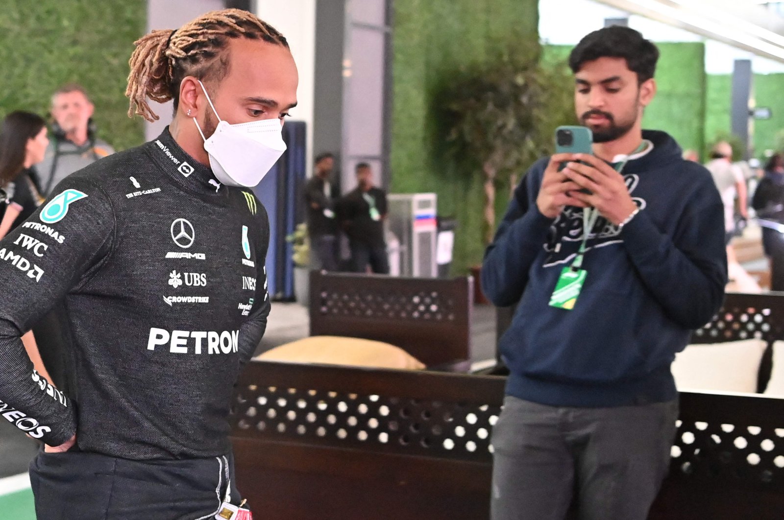 Mercedes&#039; Lewis Hamilton (L) leaves following a meeting with other F1 drivers and principals before a practice session ahead of the 2022 Saudi Arabia F1 GP, Jeddah, Saudi Arabia, March 25, 2022. (AFP Photo)